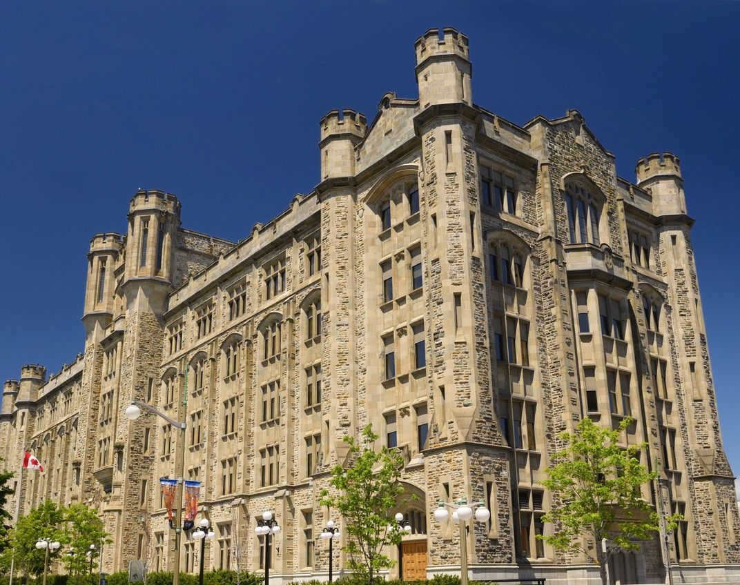 Exterior view of a Modified Norman style stone building built in 1915.